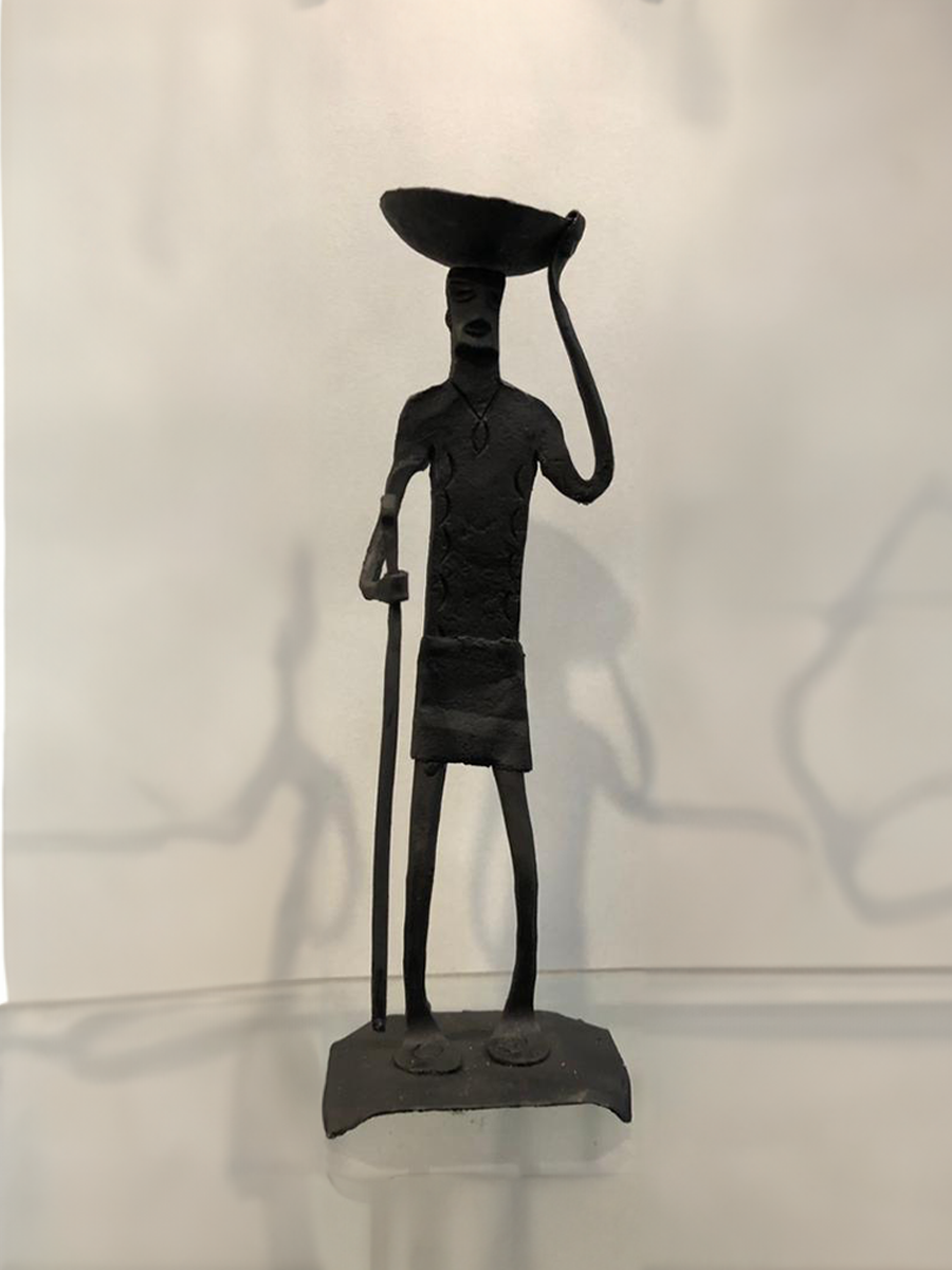 Human figure holding a stick: Bastar Iron Craft by Sameep Vishwakarma for sale