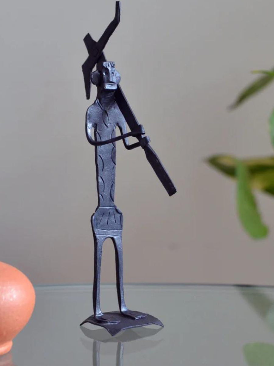 Human figure holding a plough: Bastar Iron Craft by Sameep Vishwakarma for sale