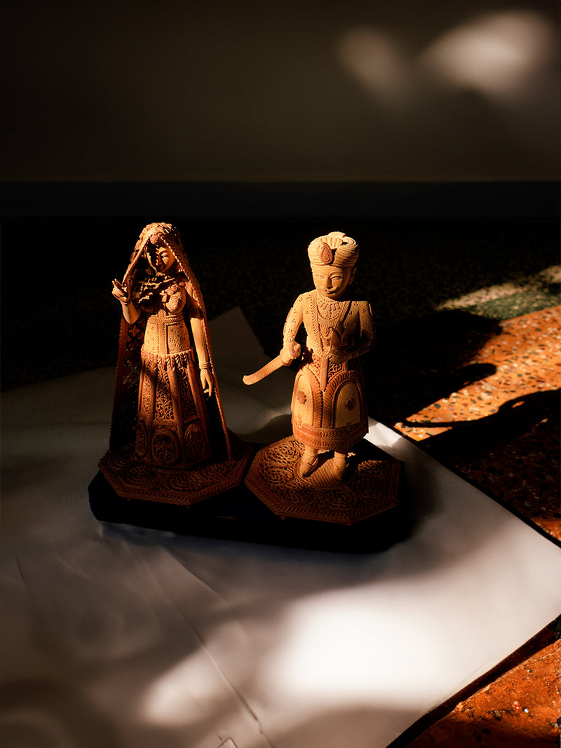 Ancient Tales on Wood: The Graceful Raja Rani Ray Sandalwood Carving, now on sale!