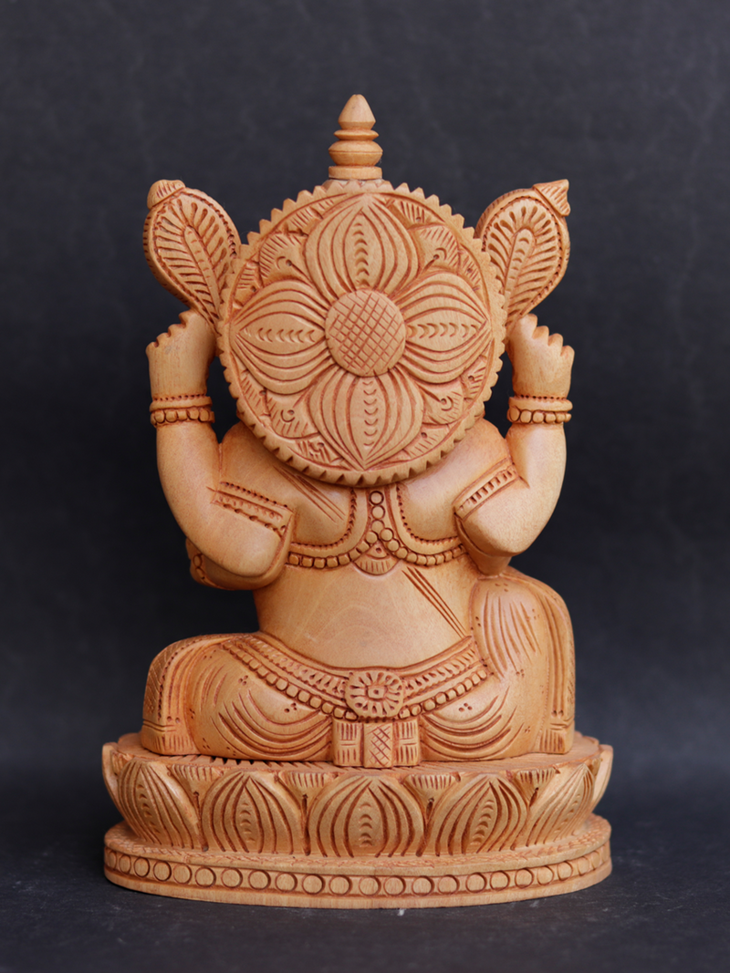Seating Ganesh in Kadam wood Carving by Om Prakash