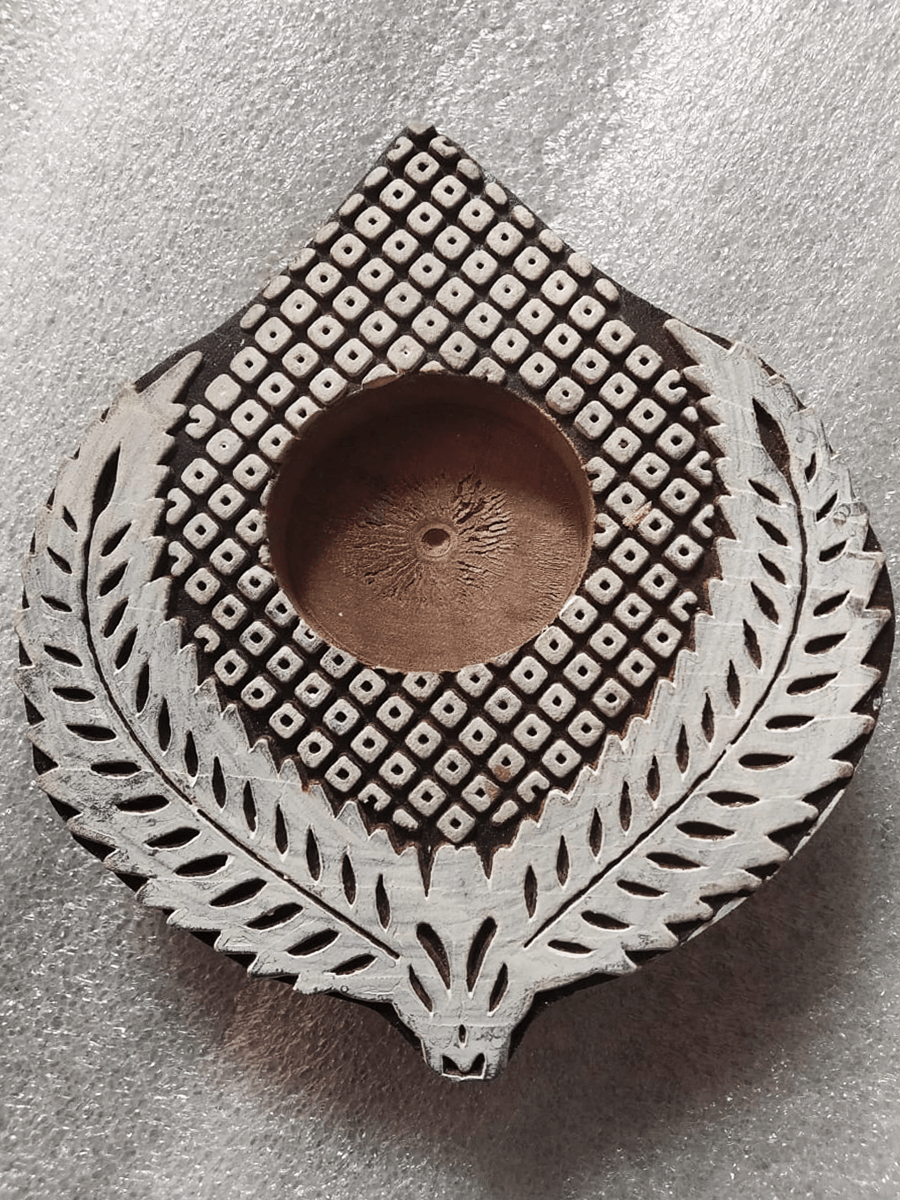 Leaf Shaped China Berry Wooden Block Diya Set by Vikas Singh Thumbnail