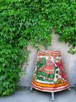 Buy Regal Elegance : Vibrancy in Tholu Lamps by Kanday Anjanapp