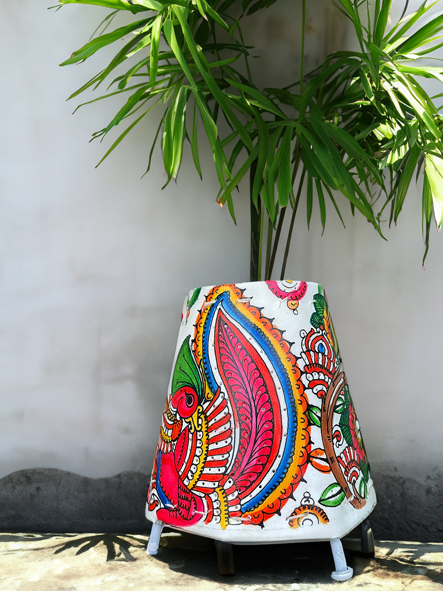 Buy today Peacock's Brilliance: A Tholu Bommalatta Lamp of Colourful Splendour 