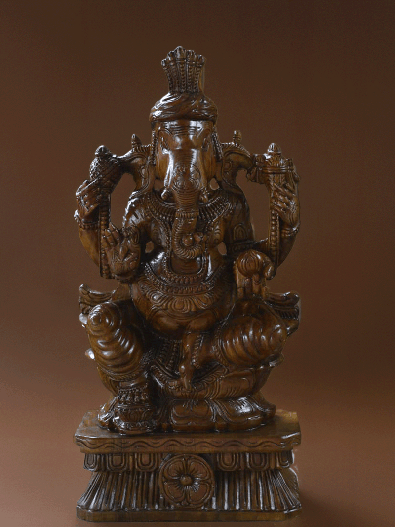 Shop Lord Ganesha: The beloved God of Wsidom in Wood Carving by Shrinivasan