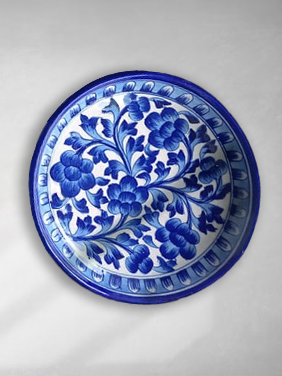 Buy Blue Flowers in Blue Pottery Plates by Vikram Kharol