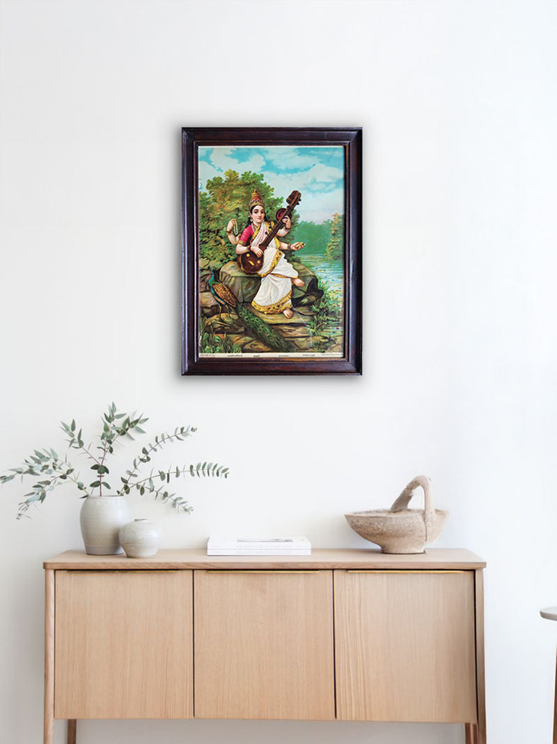 Goddess Saraswati amidst Nature in Oleograph by Raja Ravi Varma