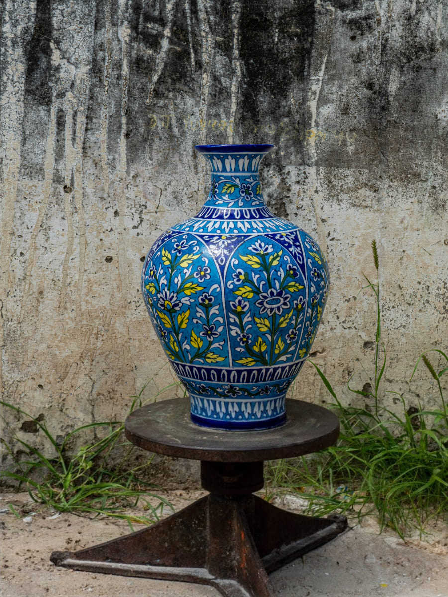 Sunlit Azure Bloom: The Enchanting Pot of Nature's Delight, Blue Pottery By Gopal Saini for sale