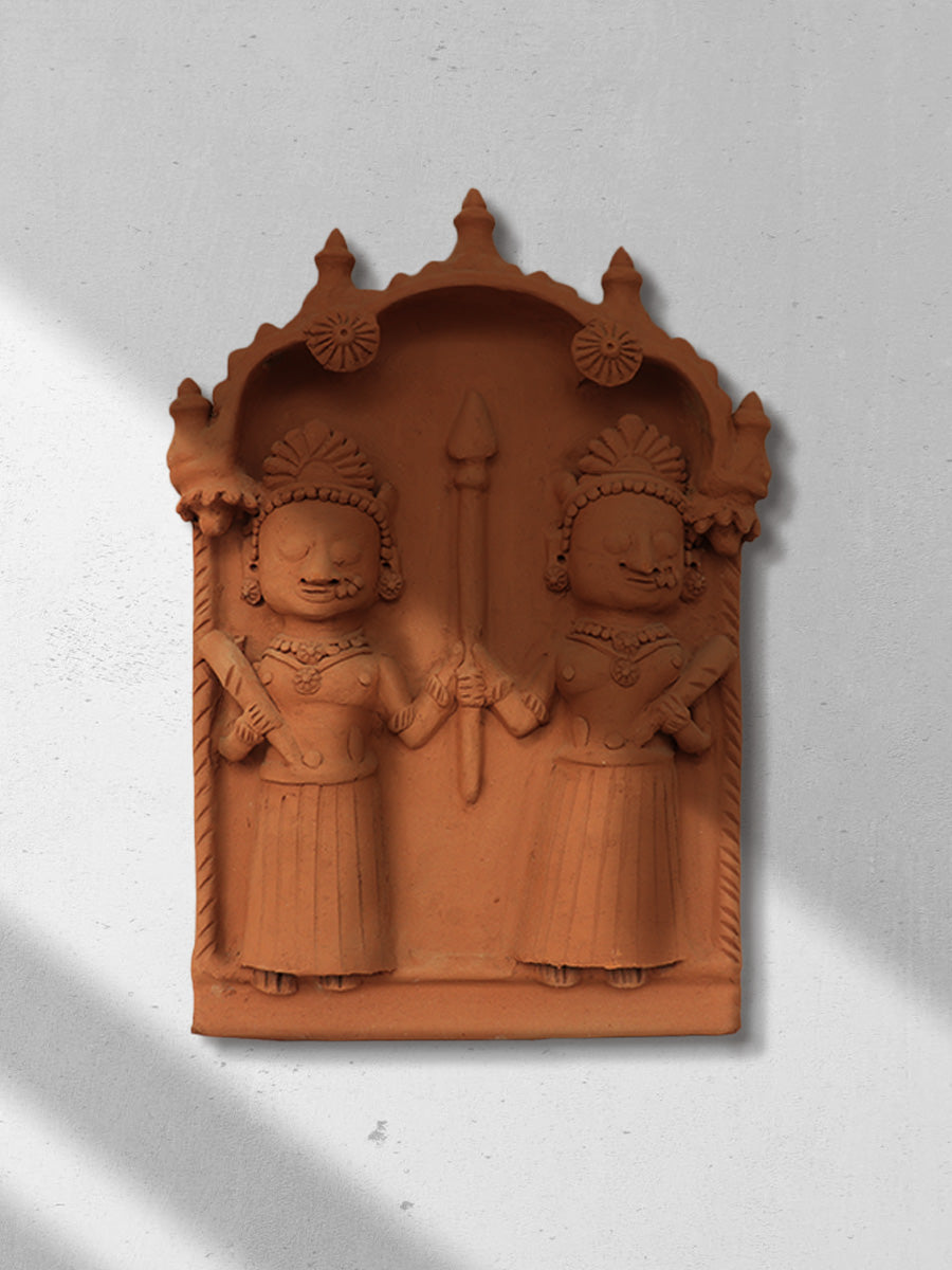 Imagery of doormen with their arms: Terracotta by Dinesh Molela
