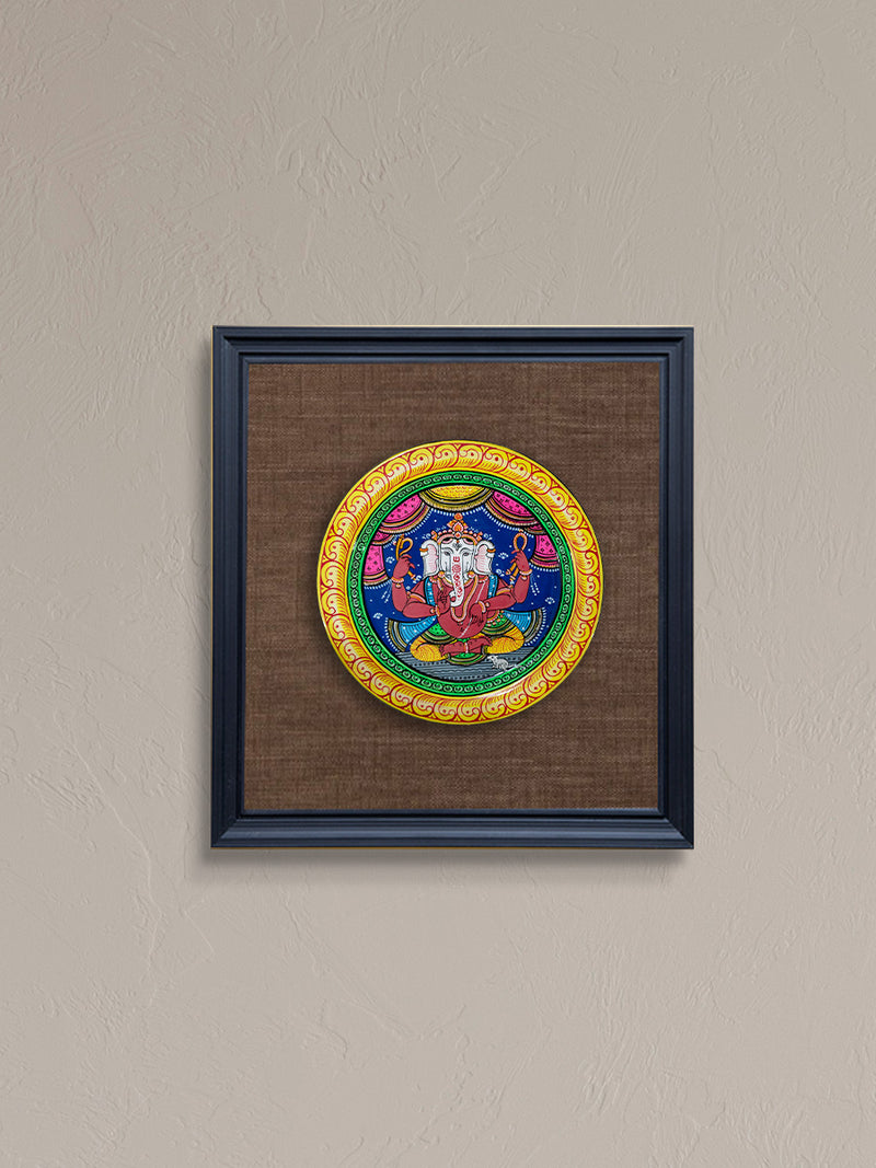 Melodic Blend of Art and Mythology: Colourful Ganesha Pattachitra on a Wooden Plate  by Apindra Swain for sale