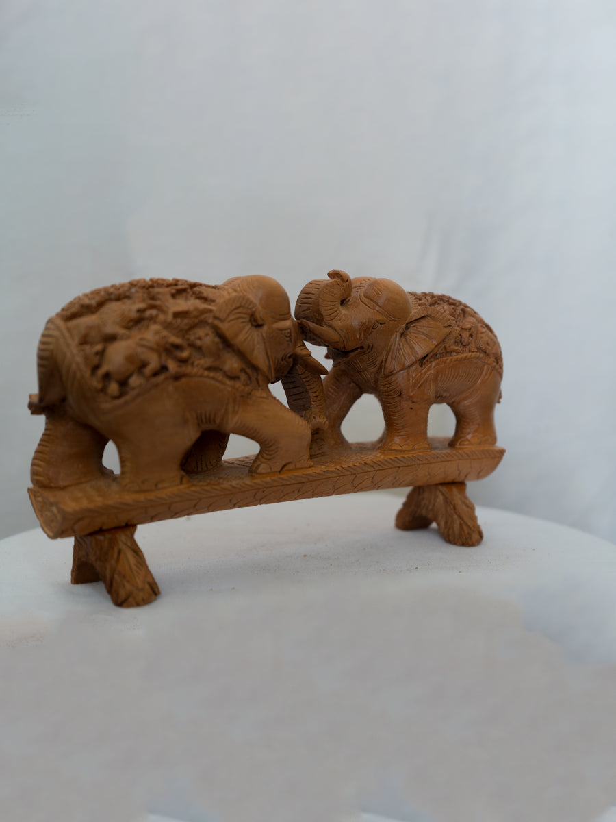 Shop now for Elephant Guardians: A Wooden Carving of Eternal Bonds.