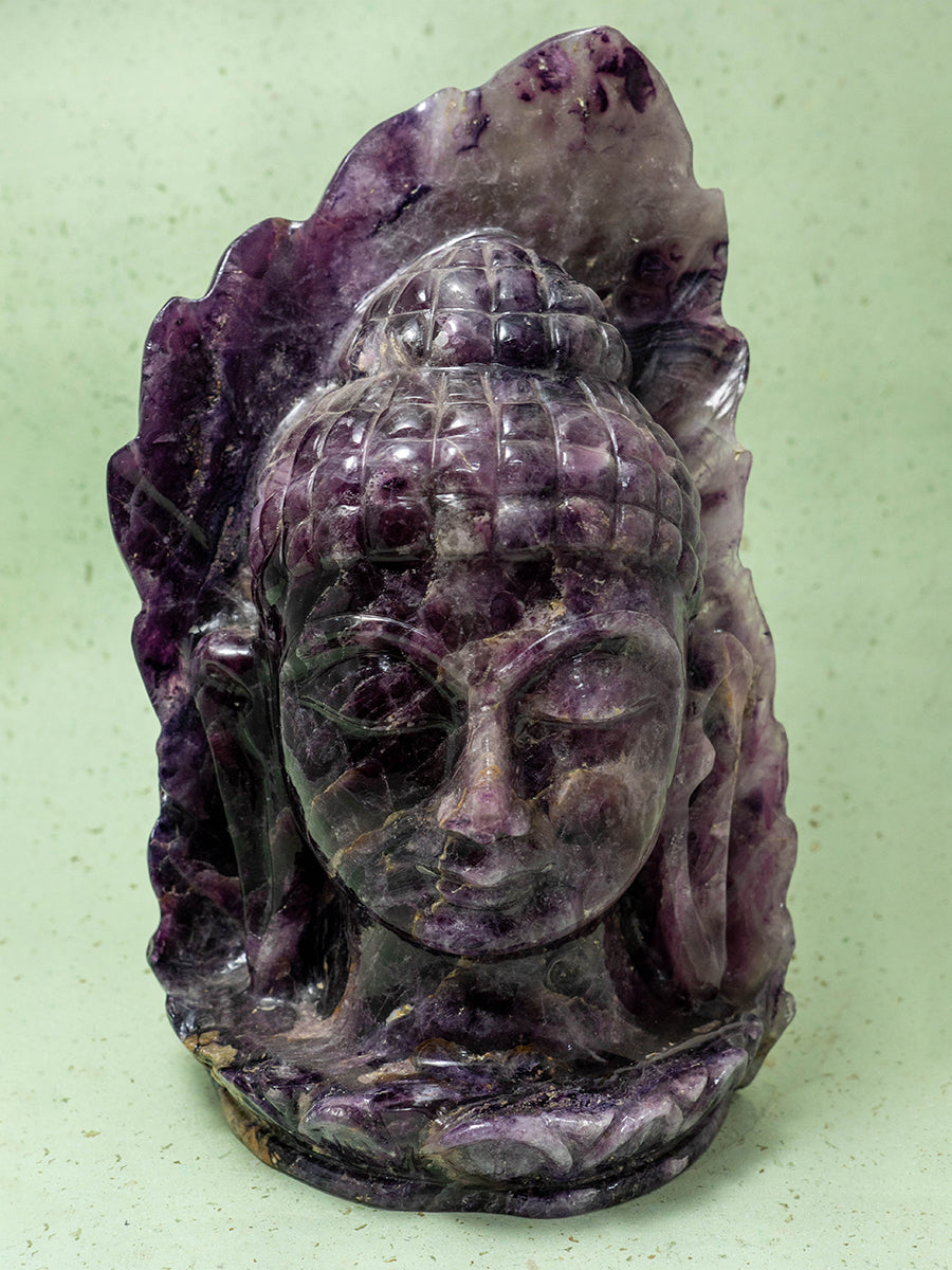 Awakening Grace: Purple Fluorite Carving of Buddha 