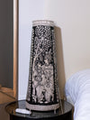 Celestial Love: Tholu Lamps of Radha and Krishna Amidst the Darkness for Sale