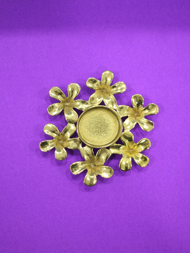 Champa flower Tea-light holder in Brass work by Chanchal Chakraborty Thumbnail