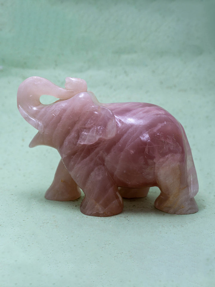 Endearing Devotion: Rose Quartz of Mother and Baby Elephant by Prithvi Kumawat Thumbnail