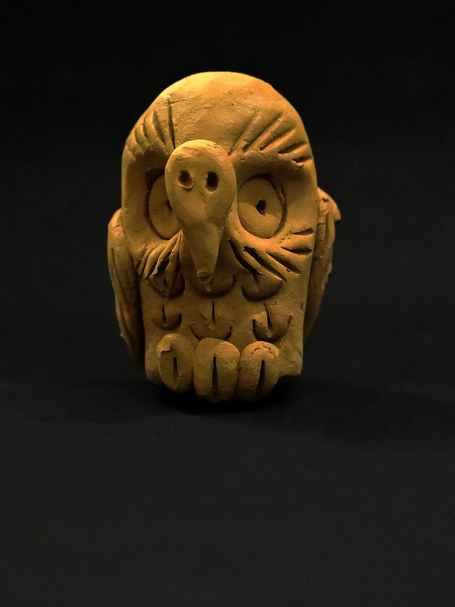 Eyes of Enigma: A Captivating Terracotta Owl Sculpture 