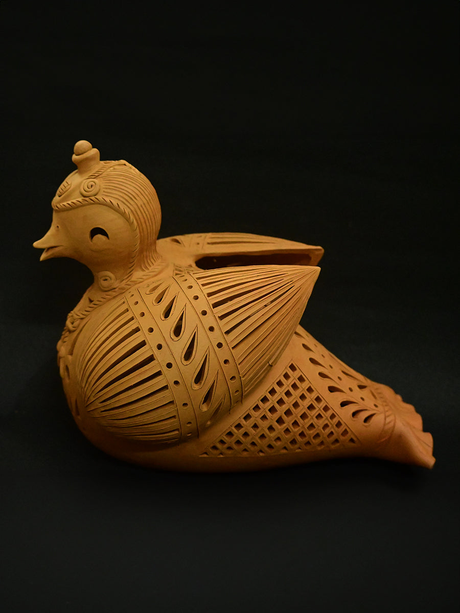 Feathered Radiance A Terracotta Tea Light, Terracotta art by Dolon Kundu