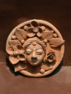 Buy Feminine Whispers Terracotta Plate of a Floral-Embellished Face, Terracotta art by Dolon Kundu