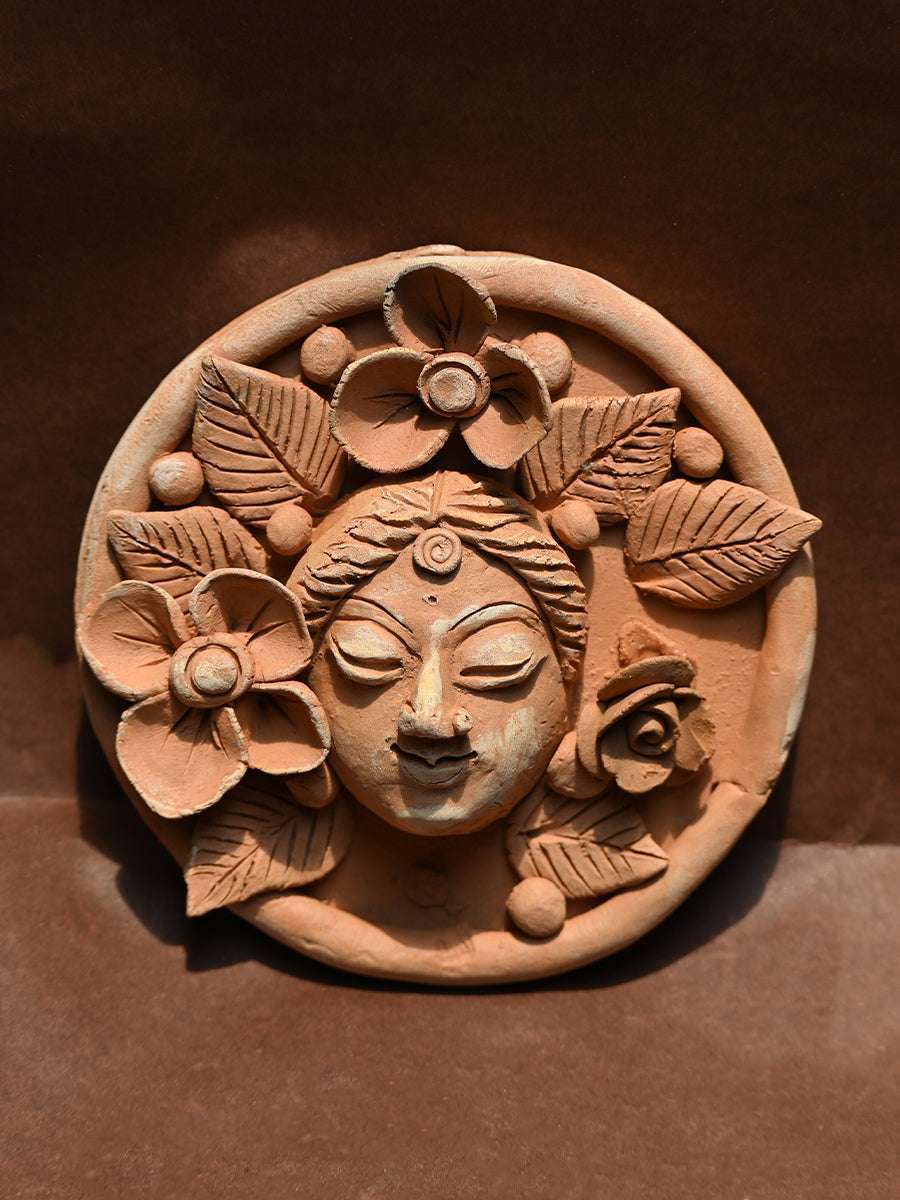 Buy Feminine Whispers Terracotta Plate of a Floral-Embellished Face, Terracotta art by Dolon Kundu