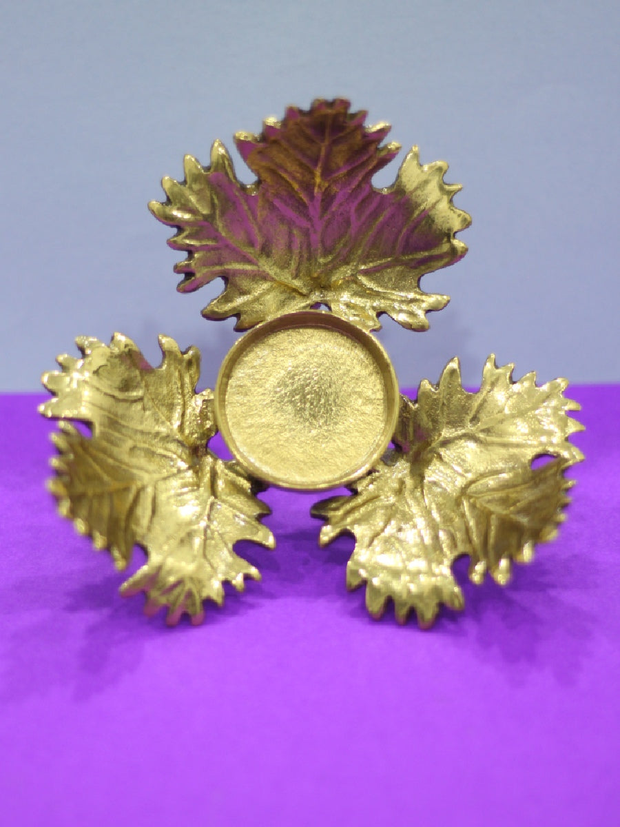 Buy Grape leaf T-light holder in Brass work by Chanchal Chakraborty