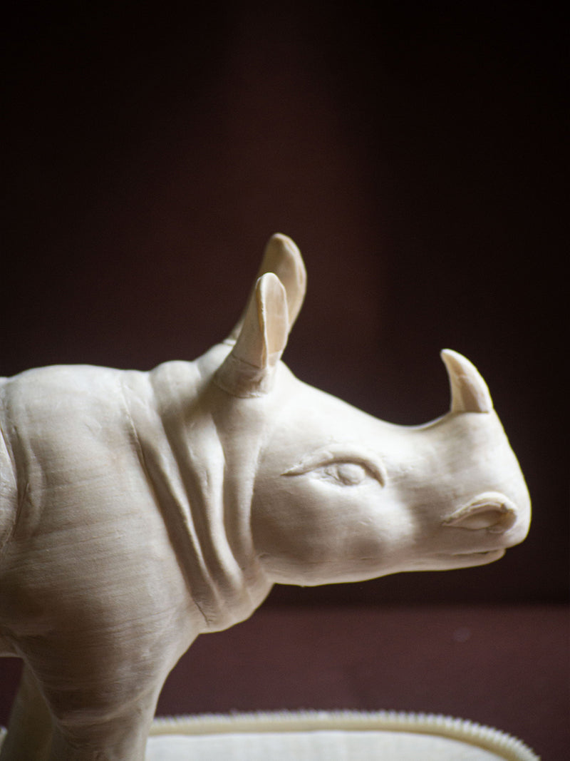 Guardian of the Wild: A Majestic Carving of Rhinoceros by Arup Malakar