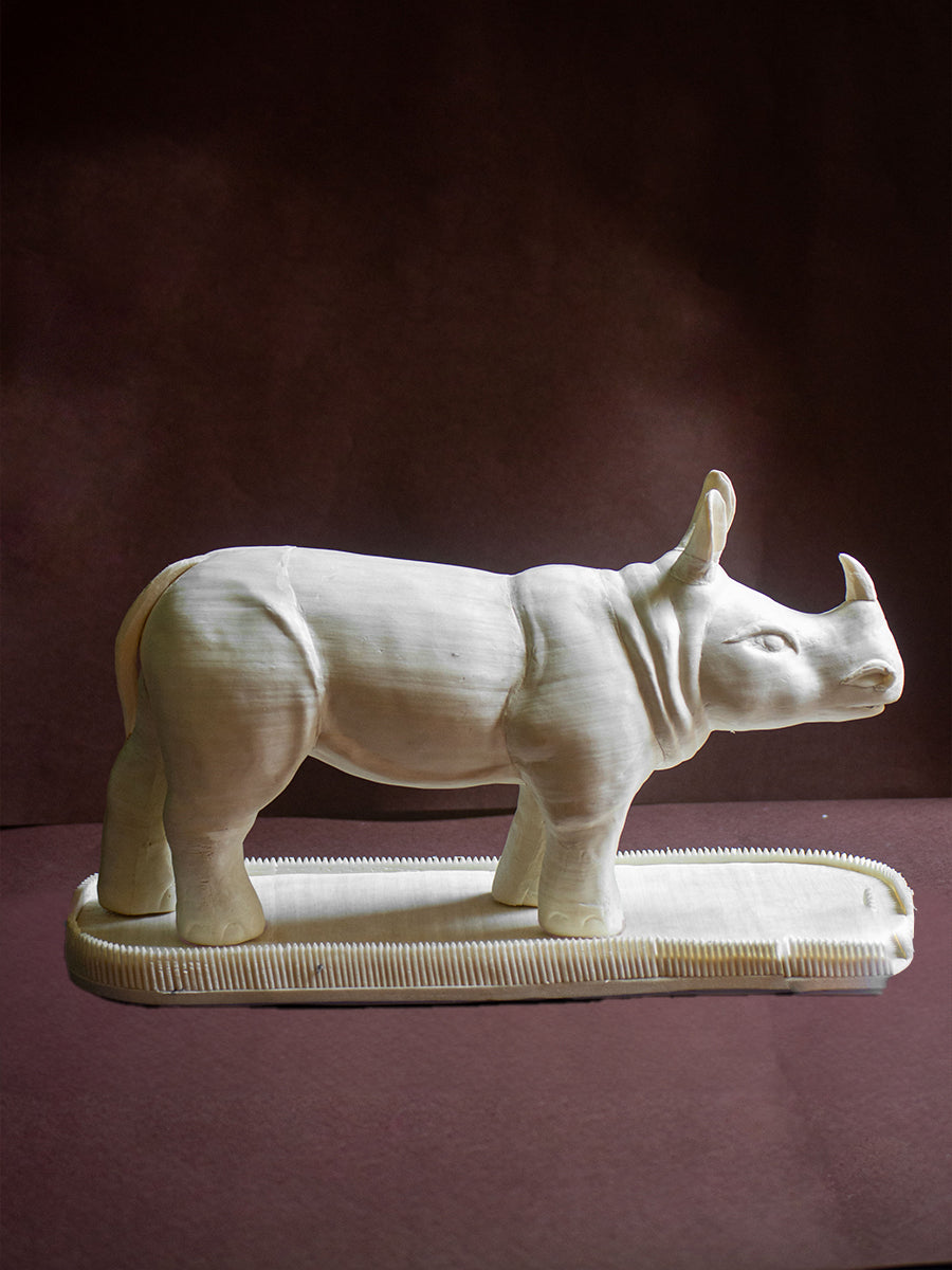 Guardian of the Wild: A Majestic Carving of Rhinoceros 