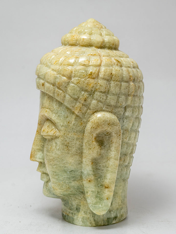 Harmony in Stone: The Golden Aquamarine Buddha's Eternal Tranquility by Prithvi Kumawat Thumbnail