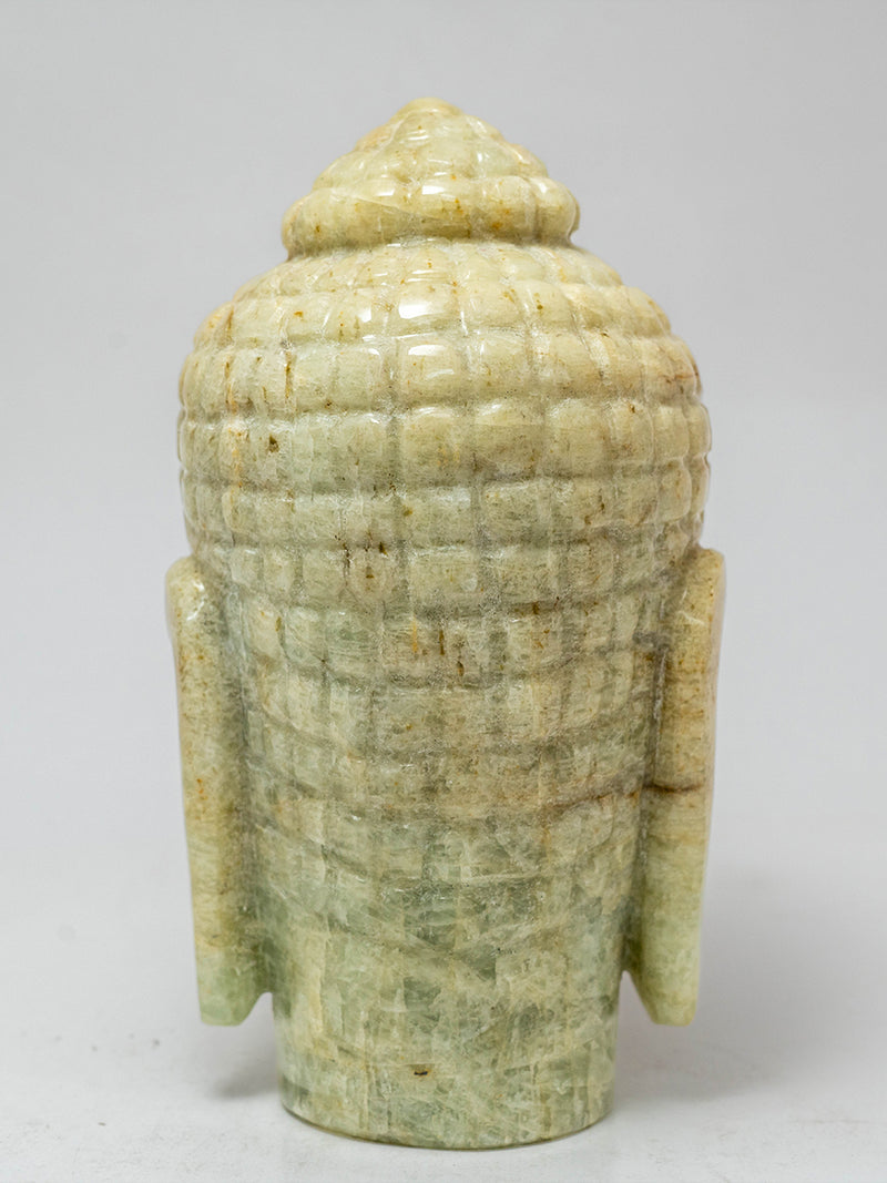 Harmony in Stone: The Golden Aquamarine Buddha's Eternal Tranquility by Prithvi Kumawat