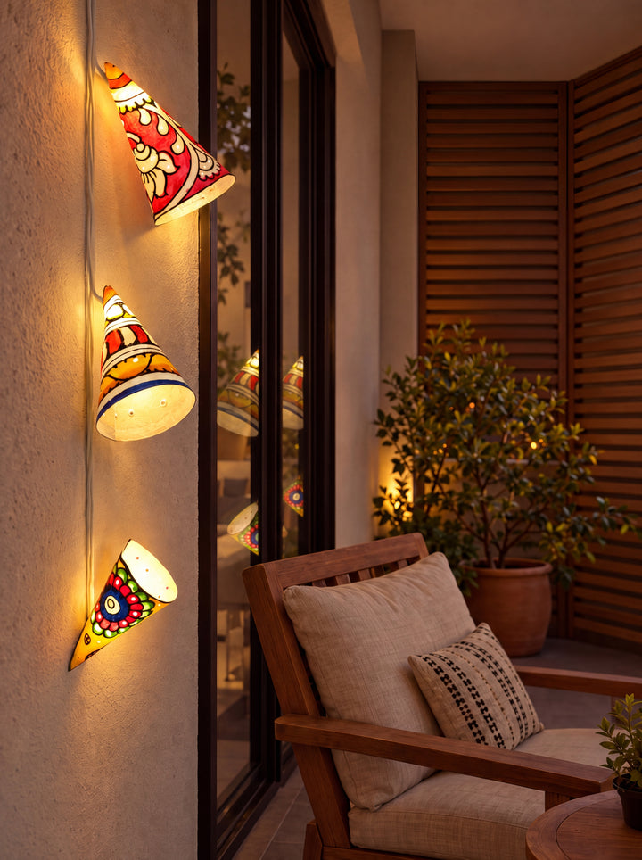 Diwali String Lights with Floral Motifs in Tholu Bommalata by Sindhe Siva Thumbnail