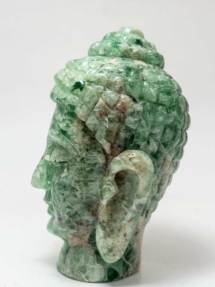Jade Serenity: The Green Fluorite Buddha's Peaceful Countenance by Prithvi Kumawat Thumbnail
