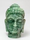 Jade Serenity: The Green Fluorite Buddha's Peaceful Countenance 