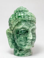 Jade Serenity: The Green Fluorite Buddha's Peaceful Countenance by Prithvi Kumawat