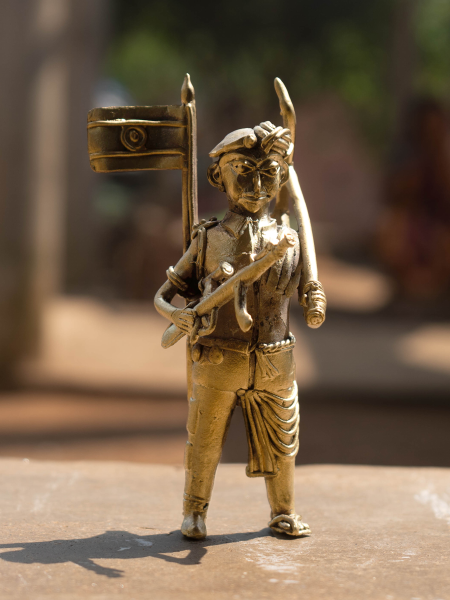 Soldier with flag and gun: Dhokra by Kunal Rana