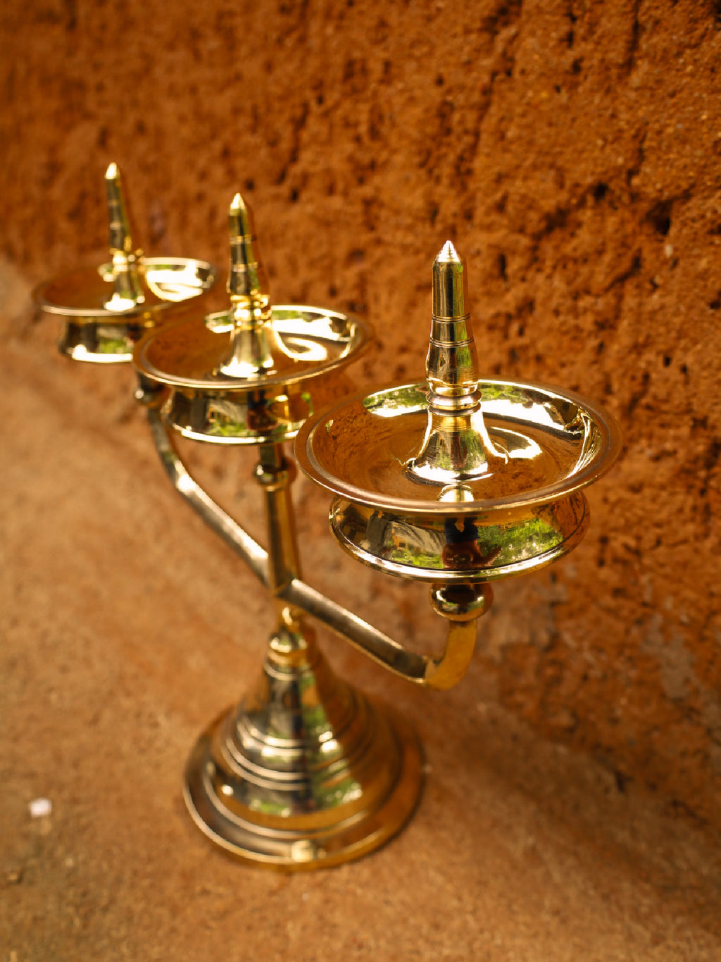Shop Kavara vilakku (lamp)
 In brass work by Dinesh A