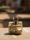 Monkey sitting on roof: Dhokra by Kunal Rana