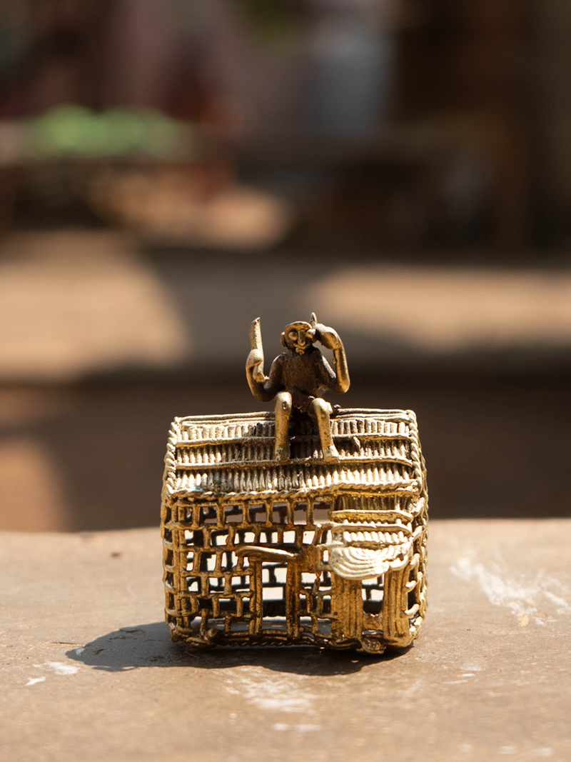 Monkey sitting on roof: Dhokra by Kunal Rana