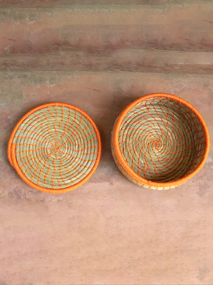 Orange curve basket: Sabai Grass Work by Gouri Mohapatra Thumbnail