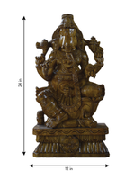 Ganesha: the lord of new beginnings in Wood carving by Shrinivasan