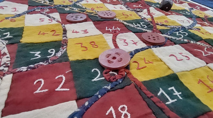 Game of Snakes and Ladders in Kutch embroidery by Kala Raksha Thumbnail