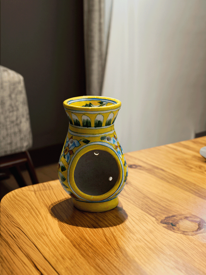 Buy online Radiant Blooms: Tealight Harmony in the Yellow Pot Blue Pottery 
