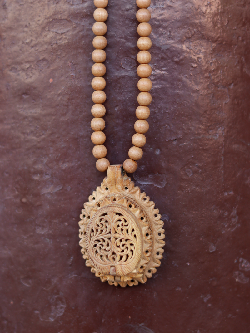 Shop Radiant Radha Krishna Sandalwood Pendant by Om Prakash  
