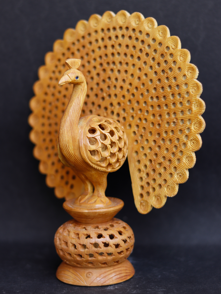Royal Peacock in Kadam wood Carving by Om Prakash Thumbnail