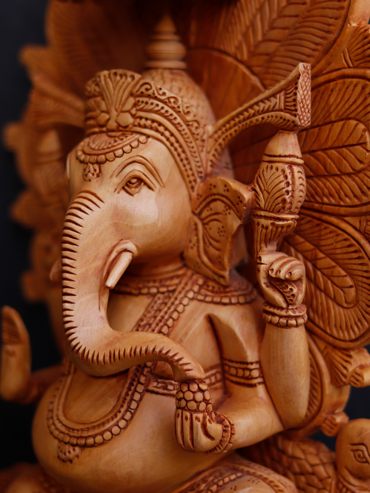 Seated Ganesh in Kadam wood Carving by Om Prakash Thumbnail