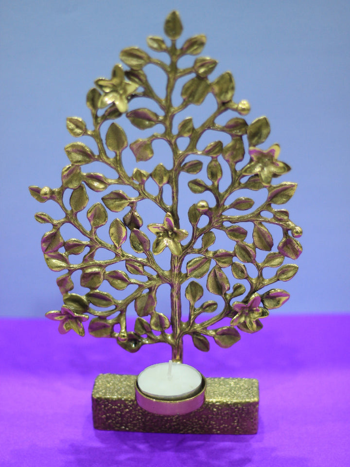 Tea light holder in Brass work by Chanchal Chakraborty Thumbnail