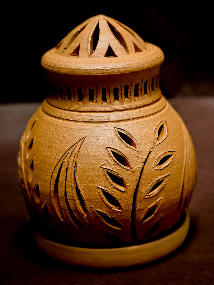 Timeless Illumination: Terracotta Model of Tea Light by Dolon Kundu Thumbnail