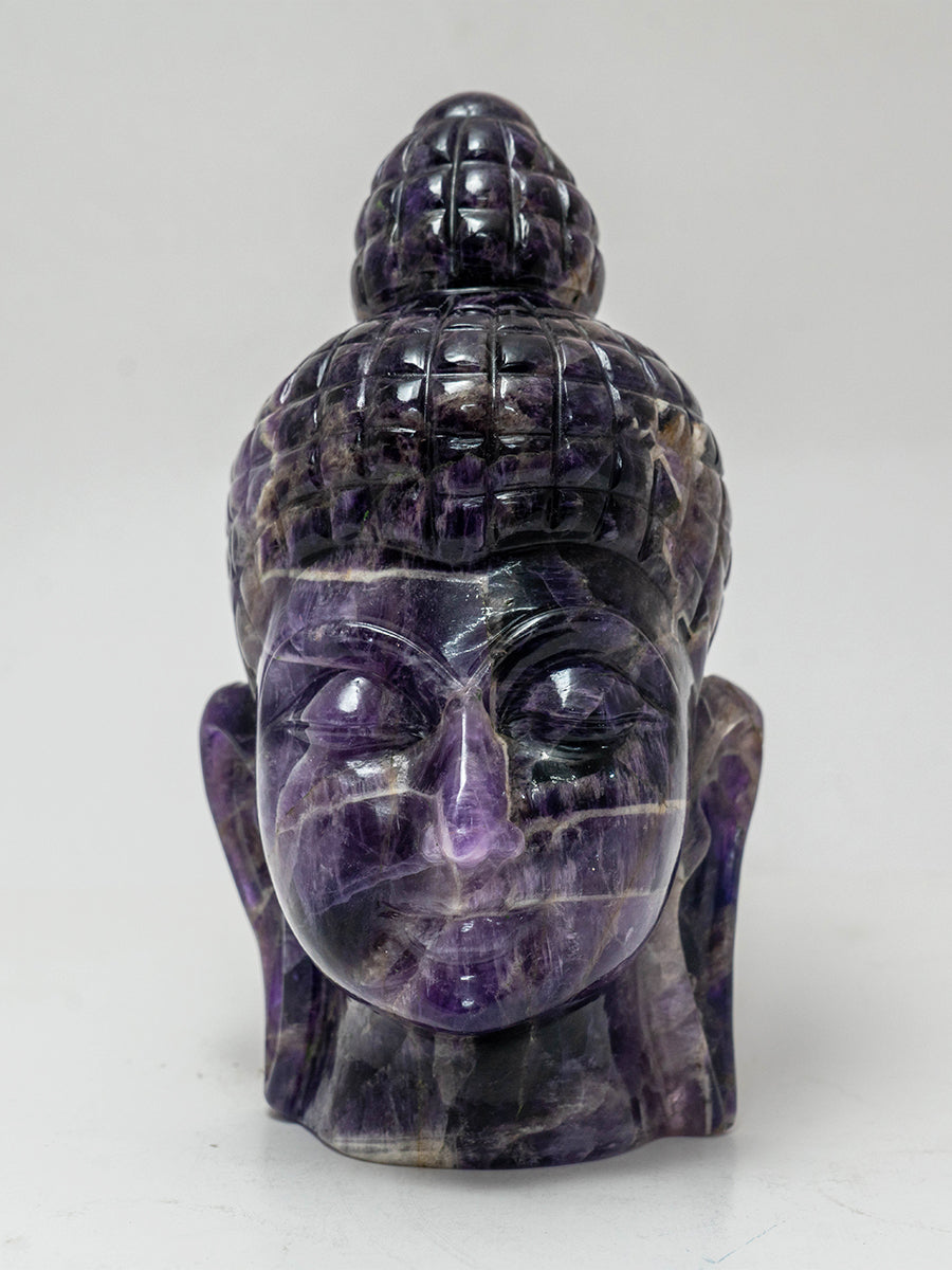 Translucent Bliss: The Ethereal Amethyst Buddha's Divine Aura 