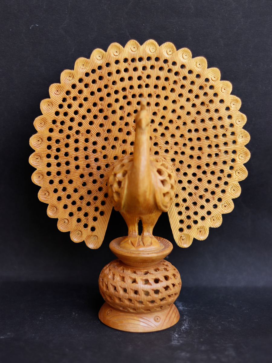 Buy Royal Peacock in Sandalwood Carving by Om Prakash