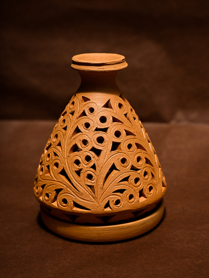 Warmth of Earth: Terracotta Tea Light Artwork by Dolon Kundu Thumbnail