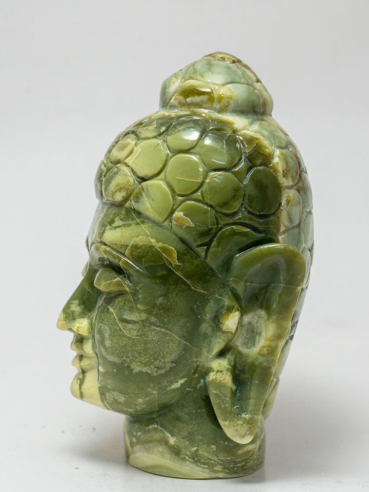 Whispers of Wisdom: The Green Serpentine Buddha's Enlightened Presence by Prithvi Kumawat Thumbnail