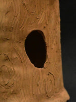 Whispers of the Forest: A Terracotta Pottery and Avian Grace 