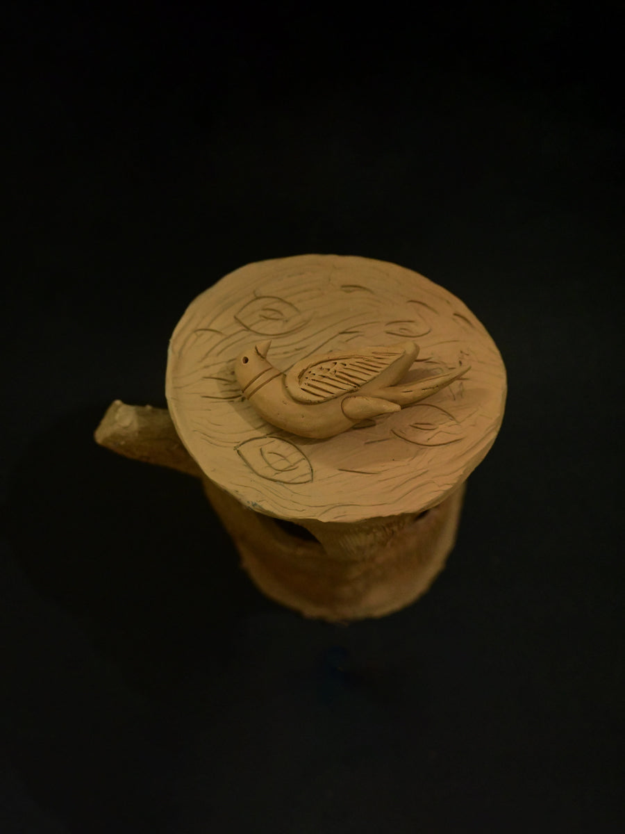 A Terracotta Pottery and Avian Grace by Dolon Kundu